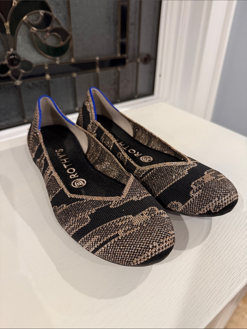 Rothy's Black and Gold Round Toe Knit Ballet Flats